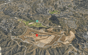 Aerial view of Scholl Canyon Landfill, highlighting its expansive layout, proximity to residential areas, and nearby Scholl Canyon Golf Course, illustrating waste management and methane mitigation efforts.