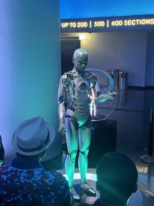 Interactive humanoid robot engaging with visitors at The Sphere Las Vegas, demonstrating the venue's innovative technology focus.